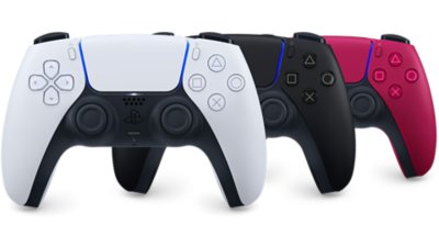 White, black and red DualSense controllers lined up next to eachother