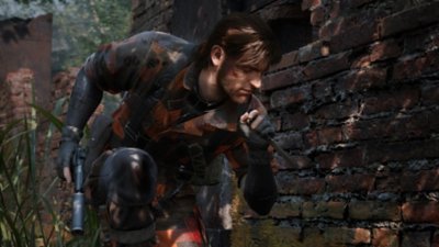 Metal Gear Solid Delta: Snake Eater - Screenshot di Snake accovacciato