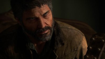 The Last of Us Part II Remastered for PC screenshot showing Joel looking up at someone offscreen.